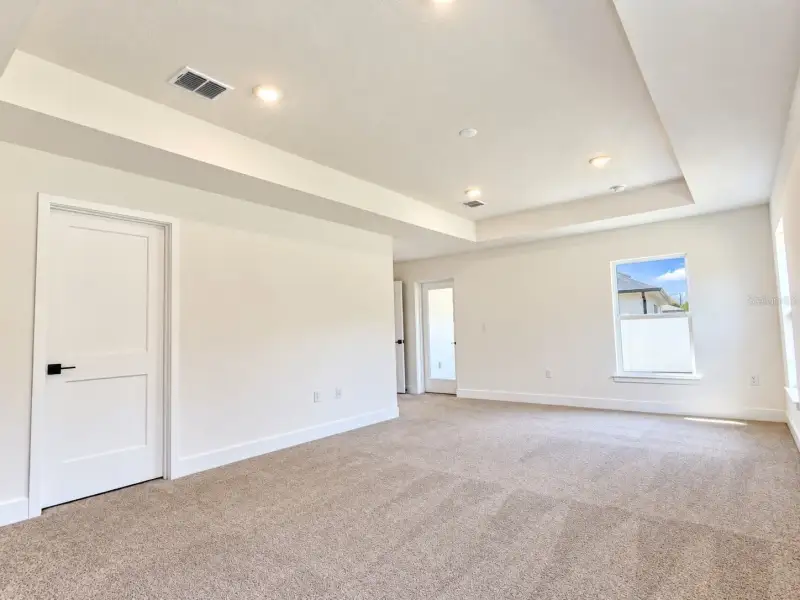 Spacious, unfurnished interior of a new home in Harmony Central, Harmony (Image 16).