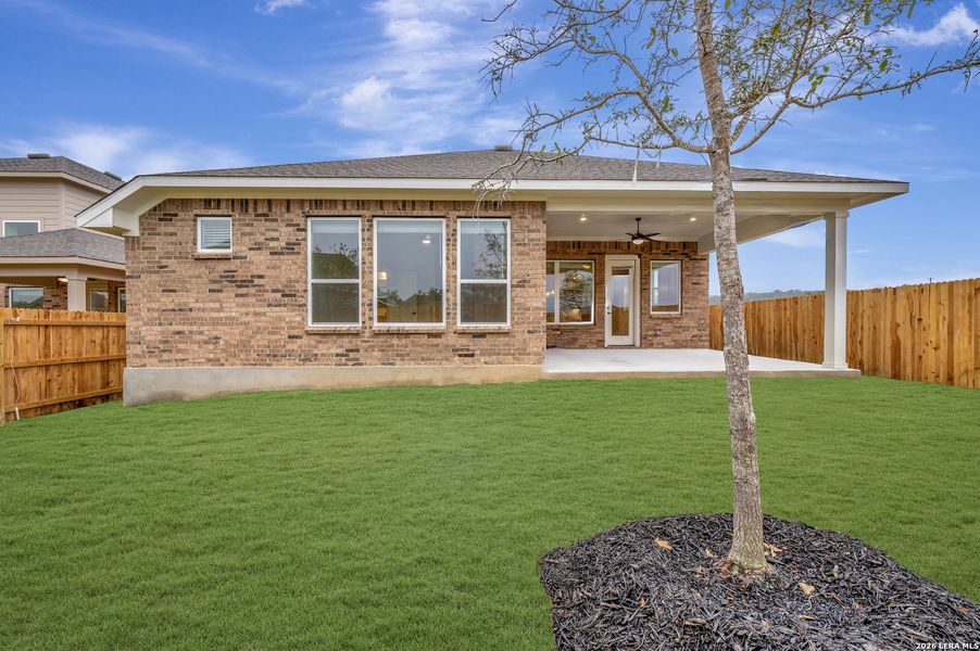Exterior details and patio area of a home in Davis Ranch 50', San Antonio (Image 23).