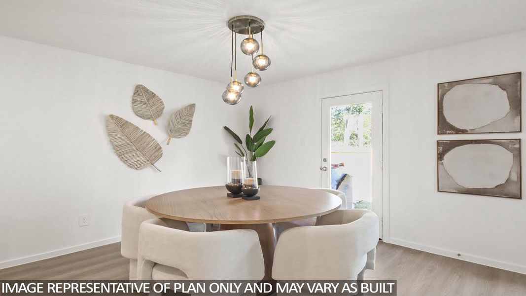 Dining area featuring baseboards and light wood-style floors