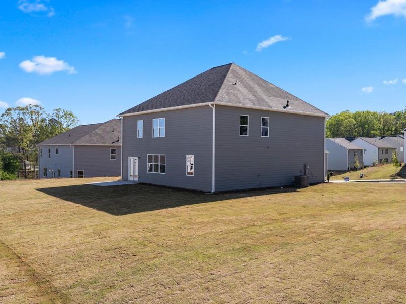 Front exterior of a new home in Thompson Ridge, Dallas, GA, highlighting curb appeal (Image 23).