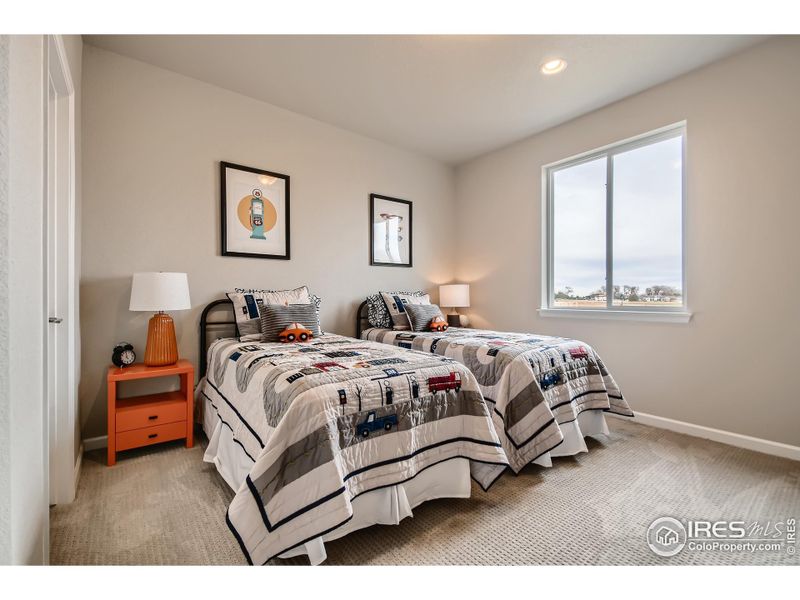 Fourth bedroom *Photo not of actual home, but same floorplan and style/colors*