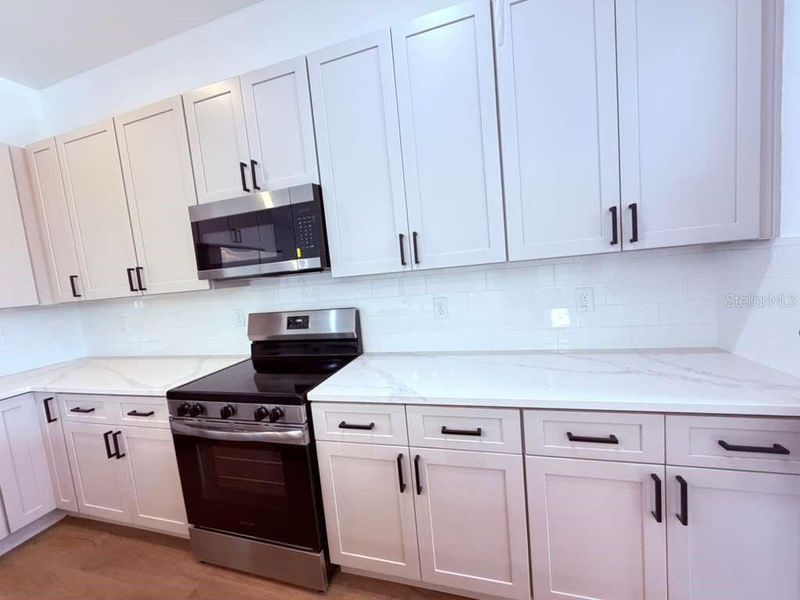 Furnished interior view inside a new home in , North Port (Image 4).