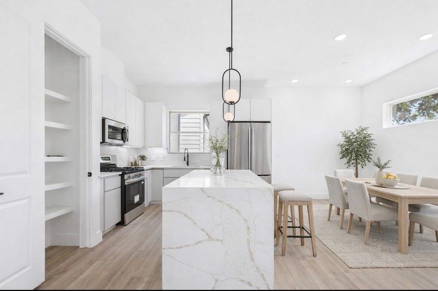 Virtually staged kitchen/dining area Virtually staged kitchen/dining area
