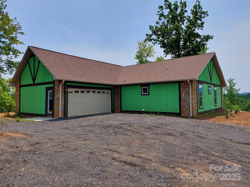 Front exterior of a new home in , Columbus, NC, highlighting curb appeal (Image 16).