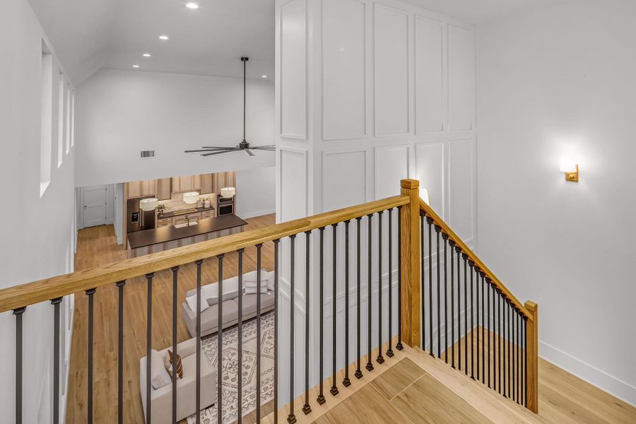 Stairs with baseboards, visible vents, a ceiling fan, wood finished floors, and recessed lighting