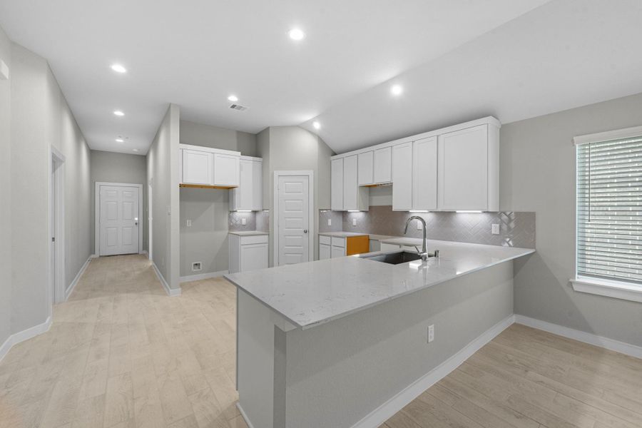 Furnished interior view inside a new home in Barton Creek Ranch, Conroe (Image 6).