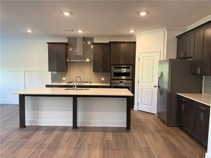Furnished interior view inside a new home in The Court at Gainesville Township, Gainesville (Image 4).