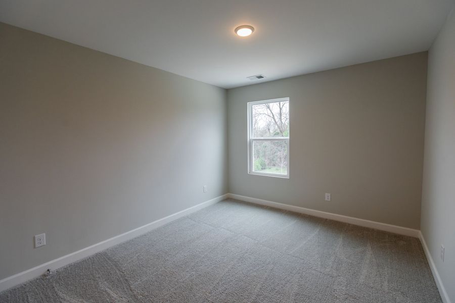 Representative unfurnished interior of a home built from the Dalton by Parkside Builders in The Woods, Gallatin (Image 17).