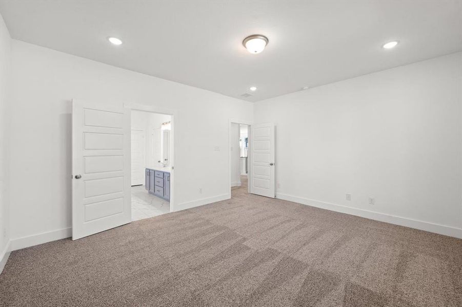 Primary bedroom with ensuite bathroom