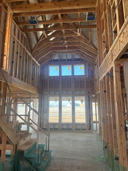 Open Family Room with soaring ceiling