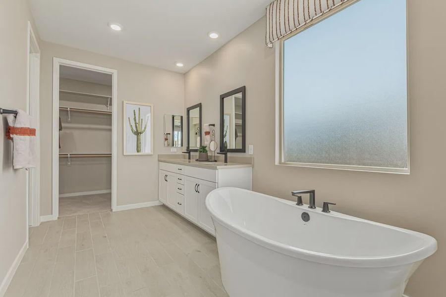 Representative furnished interior of a home built from the 2257 by Elliott Homes in Acacia at Santana, Yuma (Image 25).