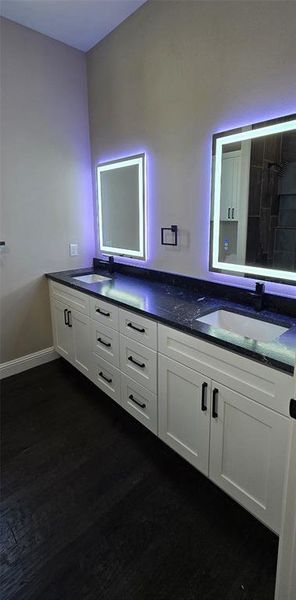 Bathroom featuring double vanity and smart anti fog, touch mirrors Bathroom featuring double vanity and smart anti fog, touch mirrors