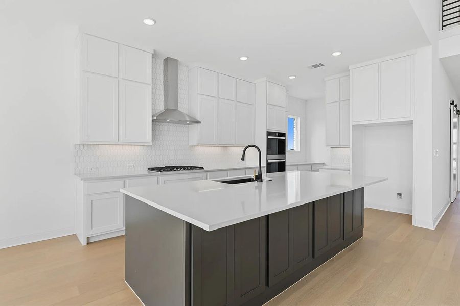 Furnished interior view inside a new home in Lariat - 70', Liberty Hill (Image 6).
