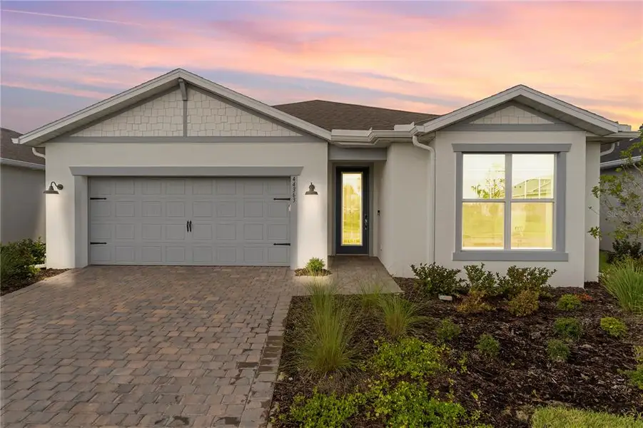 Front exterior of a new home in , Punta Gorda, FL, highlighting curb appeal (Image 2). Front exterior of a new home in , Punta Gorda, FL, highlighting curb appeal (Image 2).