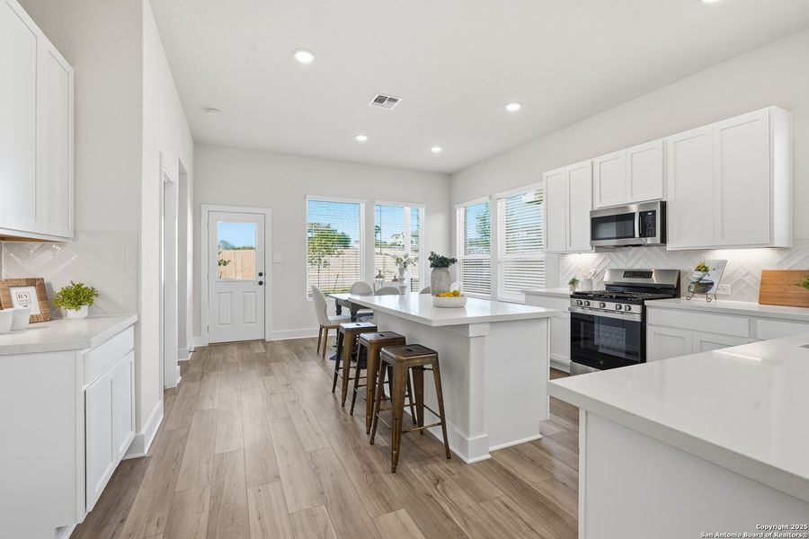 Furnished interior view inside a new home in Hunters Ranch, San Antonio (Image 12).