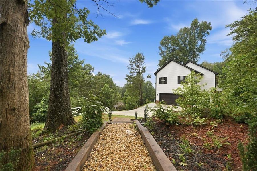 Front exterior of a new home in , Gainesville, GA, highlighting curb appeal (Image 25).