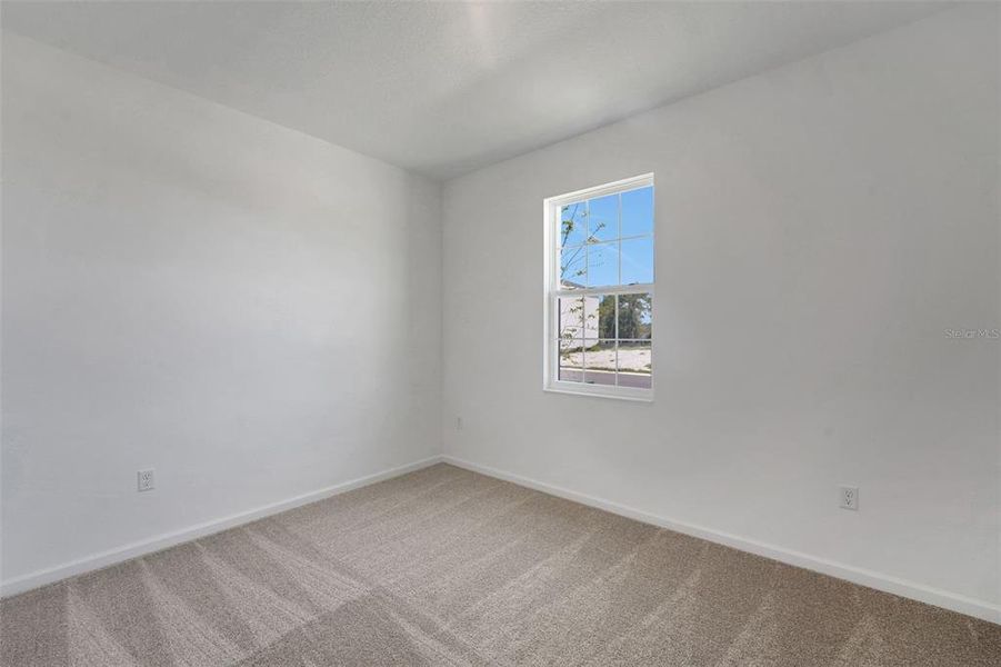 Spacious, unfurnished interior of a new home in Willowbrook North, Winter Haven (Image 29).