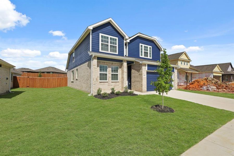 Front exterior of a new home in Burgess Meadows, Cleburne, TX, highlighting curb appeal (Image 12).