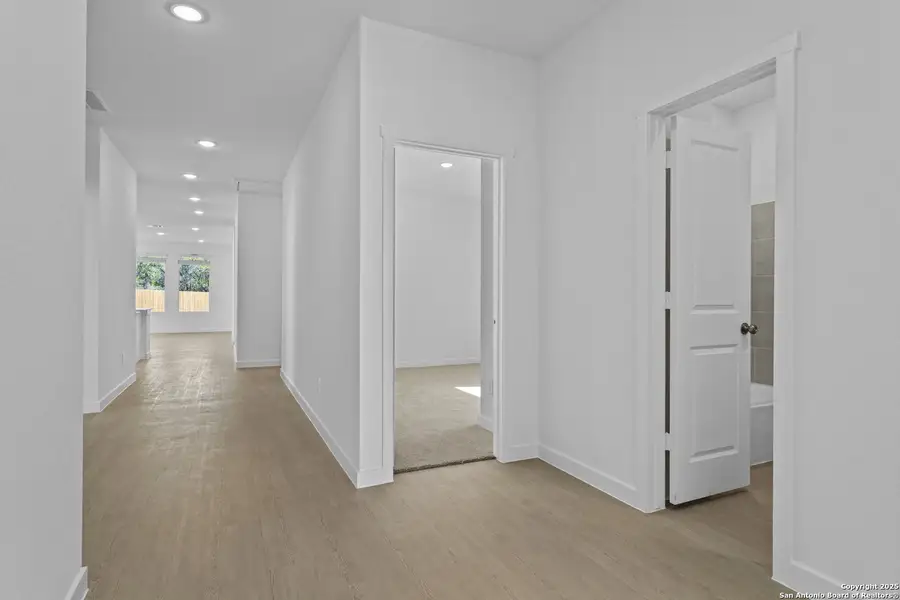 Spacious, unfurnished interior of a new home in Waterwheel: Coastline Collection, San Antonio (Image 8).