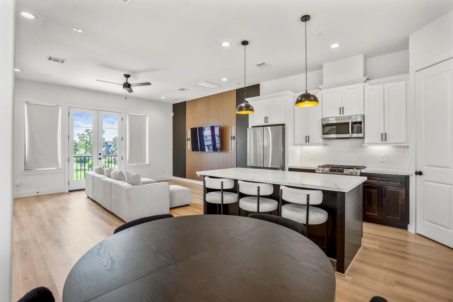 Entertainment elevated: striking custom TV wall transforms the room into a showpiece.