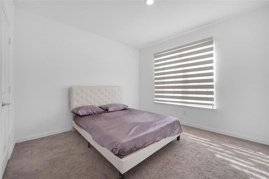 Furnished interior view inside a new home in Northlake Estates, Little Elm (Image 19). Furnished interior view inside a new home in Northlake Estates, Little Elm (Image 19).