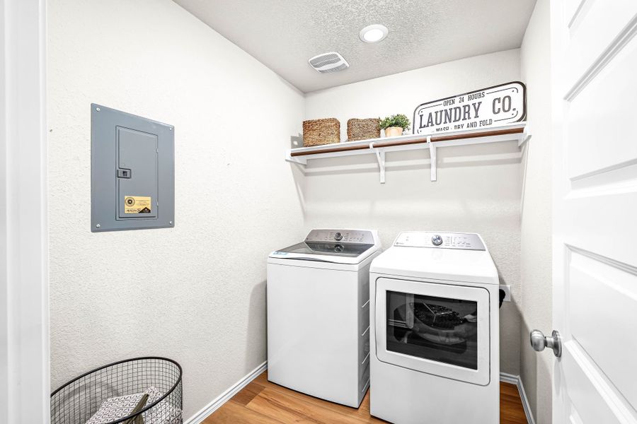 This is the laundry room in the Hawkins plan and is the model home in Carillon at 13305 Eppright Trace Blvd., Manor, TX. This is the laundry room in the Hawkins plan and is the model home in Carillon at 13305 Eppright Trace Blvd., Manor, TX.