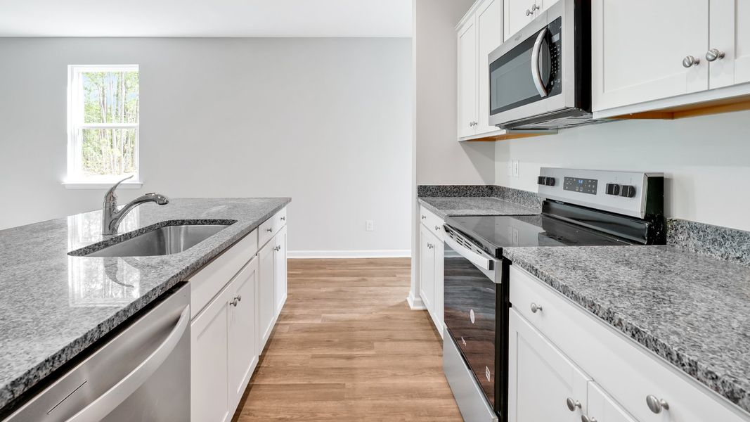 Furnished interior view inside a new home in Saltgrass Landing, Winnabow (Image 9).