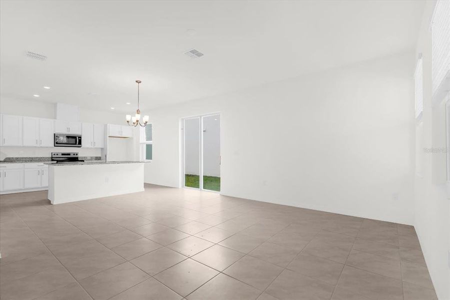 Spacious, unfurnished interior of a new home in Bellaviva III at Westside, Davenport (Image 9).