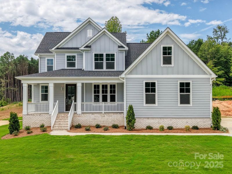 Front exterior of a new home in , Sherrills Ford, NC, highlighting curb appeal (Image 1). Front exterior of a new home in , Sherrills Ford, NC, highlighting curb appeal (Image 1).