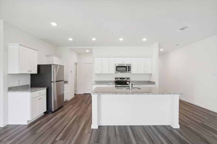Representative furnished interior of a home built from the Orbit by Starlight Homes in Coyote Meadows, Anna (Image 9). Representative furnished interior of a home built from the Orbit by Starlight Homes in Coyote Meadows, Anna (Image 9).