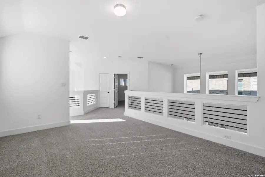 Spacious, unfurnished interior of a new home in Stillwater Ranch, San Antonio (Image 12).