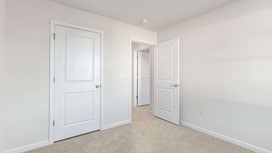 Spacious, unfurnished interior of a new home in The Townes at Honeycutt Oaks, Angier (Image 16).