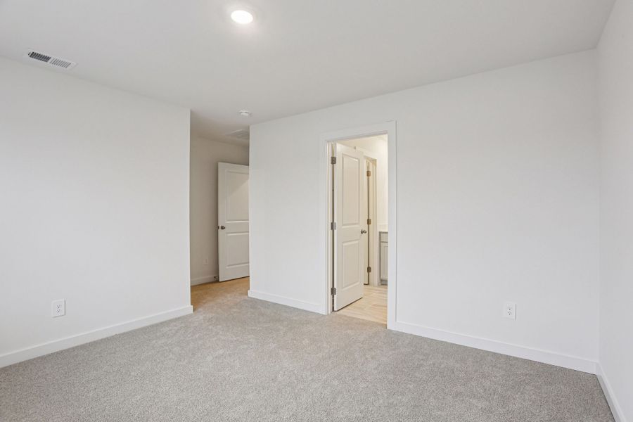 Spacious, unfurnished interior of a new home in Greystone - Highland Townhomes, Smyrna (Image 12).