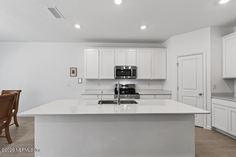 Furnished interior view inside a new home in St Augustine Lakes, St. Augustine (Image 48).