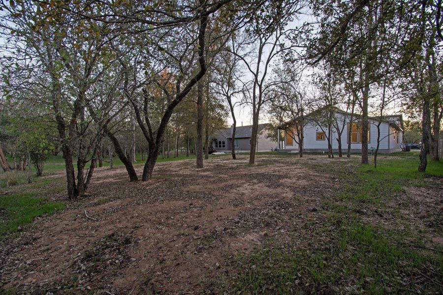 Exterior details and patio area of a home in , Bastrop (Image 28).
