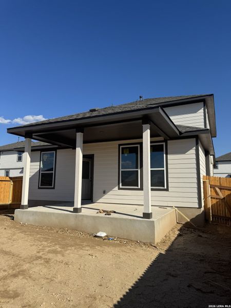 Exterior details and patio area of a home in Hickory Ridge, Elmendorf (Image 4).