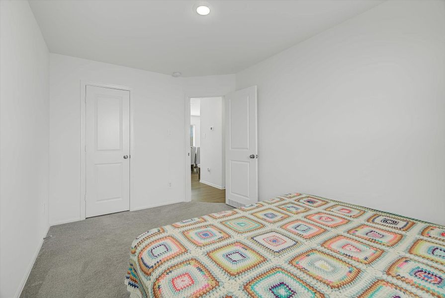 Spacious, unfurnished interior of a new home in Pinewood at Grand Texas: Colonial & Cottage Collections, New Caney (Image 18).