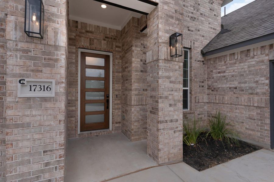 Exterior details and patio area of a home in The Grove at Blackhawk, Pflugerville (Image 27).