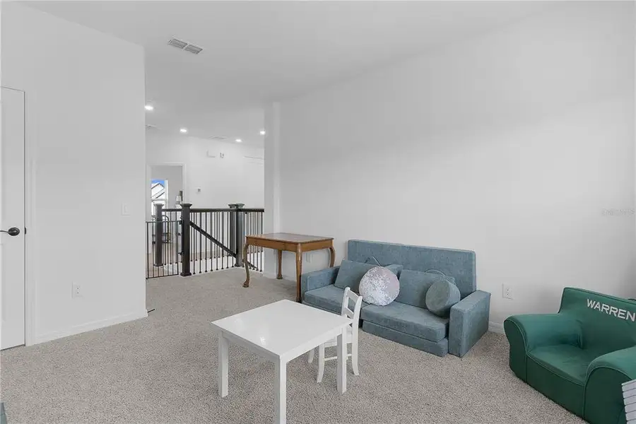 Furnished interior view inside a new home in , Clermont (Image 40).