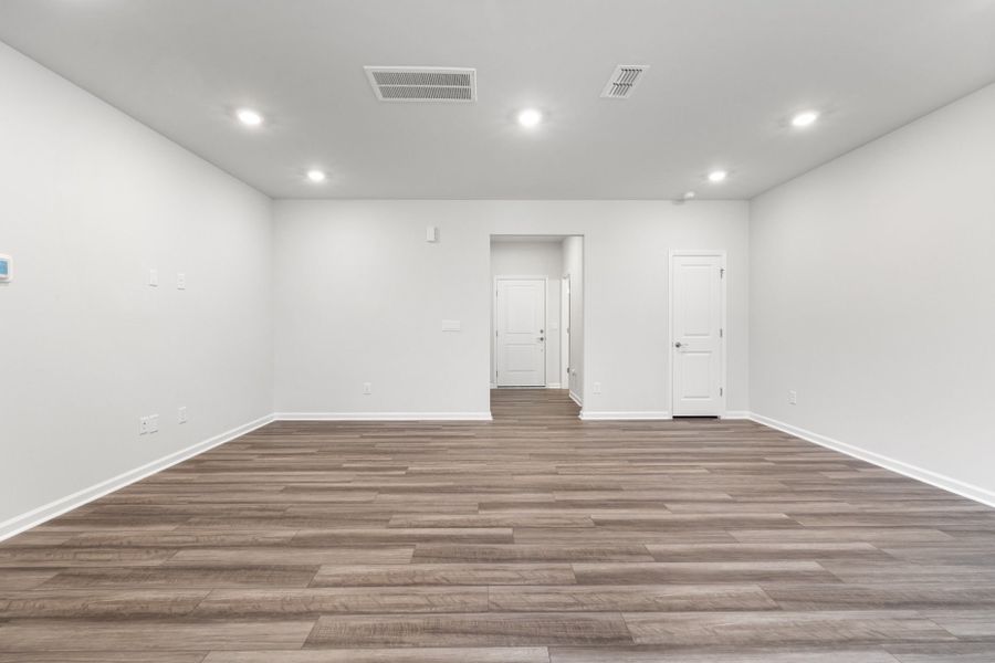 Spacious, unfurnished interior of a new home in Poets Walk, Whitsett (Image 15).