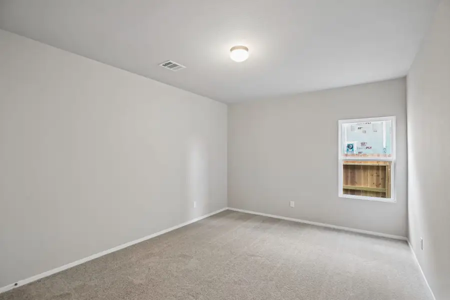 Spacious, unfurnished interior of a new home in Sorella, Tomball (Image 20).