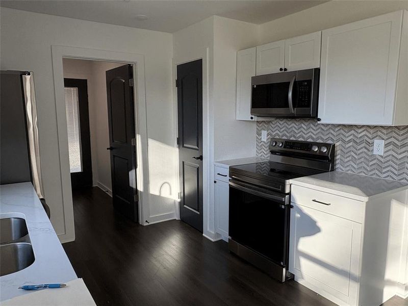 Furnished interior view inside a new home in , Mineola (Image 3).