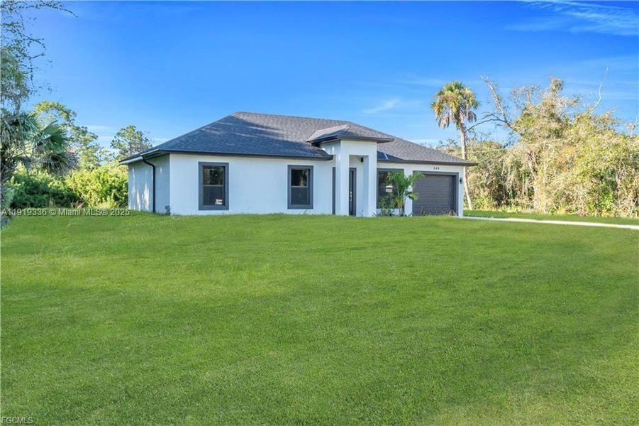 Exterior details and patio area of a home in , Lehigh Acres (Image 4). Exterior details and patio area of a home in , Lehigh Acres (Image 4).