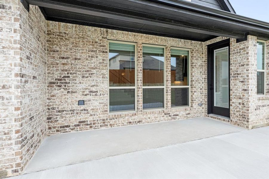 Exterior details and patio area of a home in Timberbrook, Justin (Image 4). Exterior details and patio area of a home in Timberbrook, Justin (Image 4).