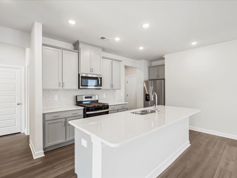 Furnished interior view inside a new home in The Farm at Wells Creek - Heritage Collection, Gray Court (Image 3).