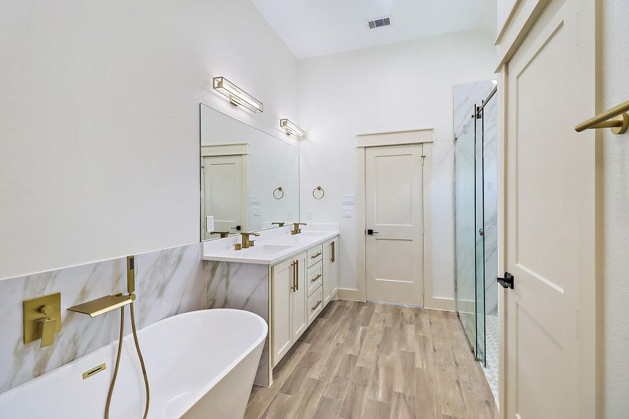 View from your custom closet to the primary bathroom