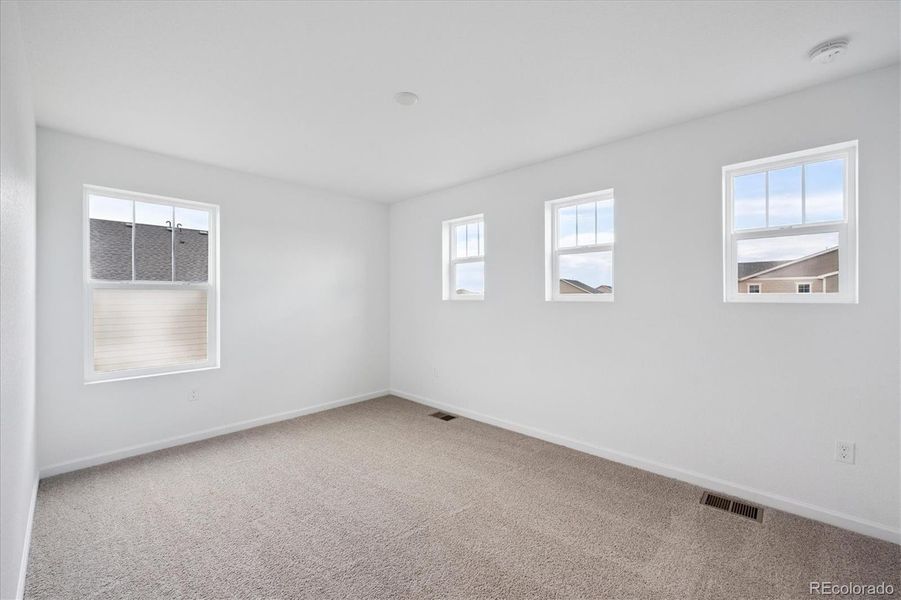 Spacious, unfurnished interior of a new home in Fossil Creek, Windsor (Image 9).