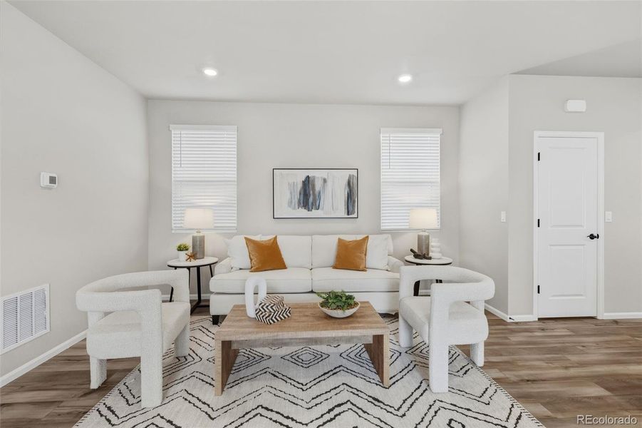 Furnished interior view inside a new home in Woodrose at Painted Prairie, Aurora (Image 3).