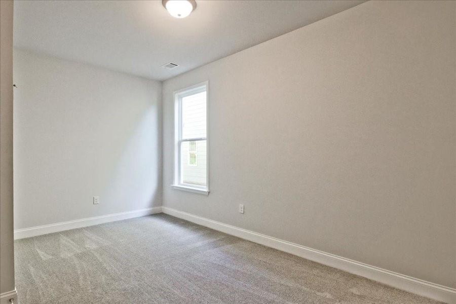 Spacious, unfurnished interior of a new home in Cooper's Walk, Loganville (Image 14).