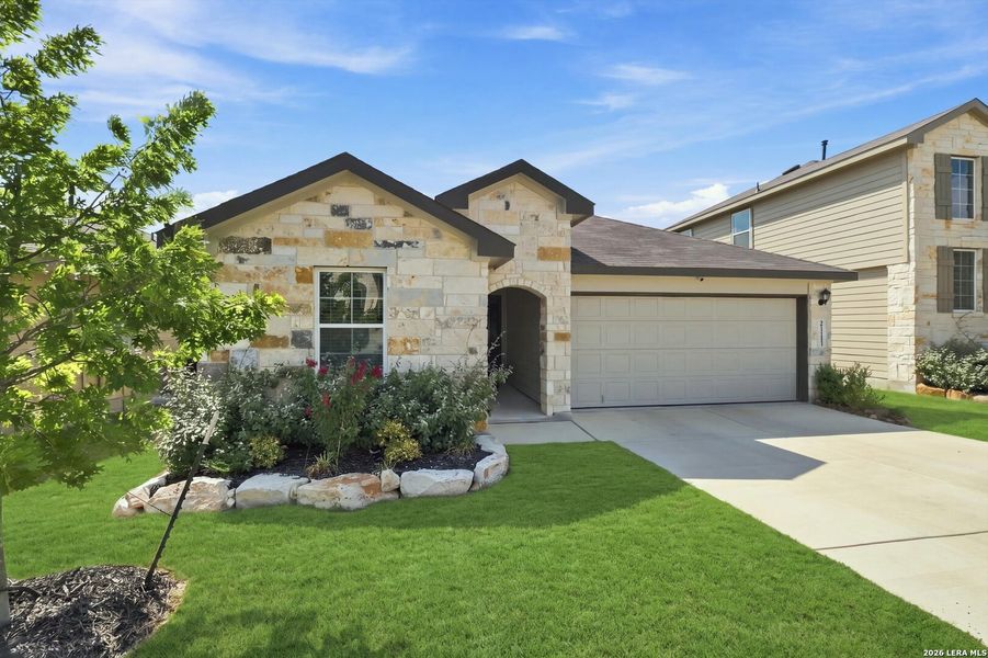 Front exterior of a new home in Brookstone Creek, San Antonio, TX, highlighting curb appeal (Image 21).